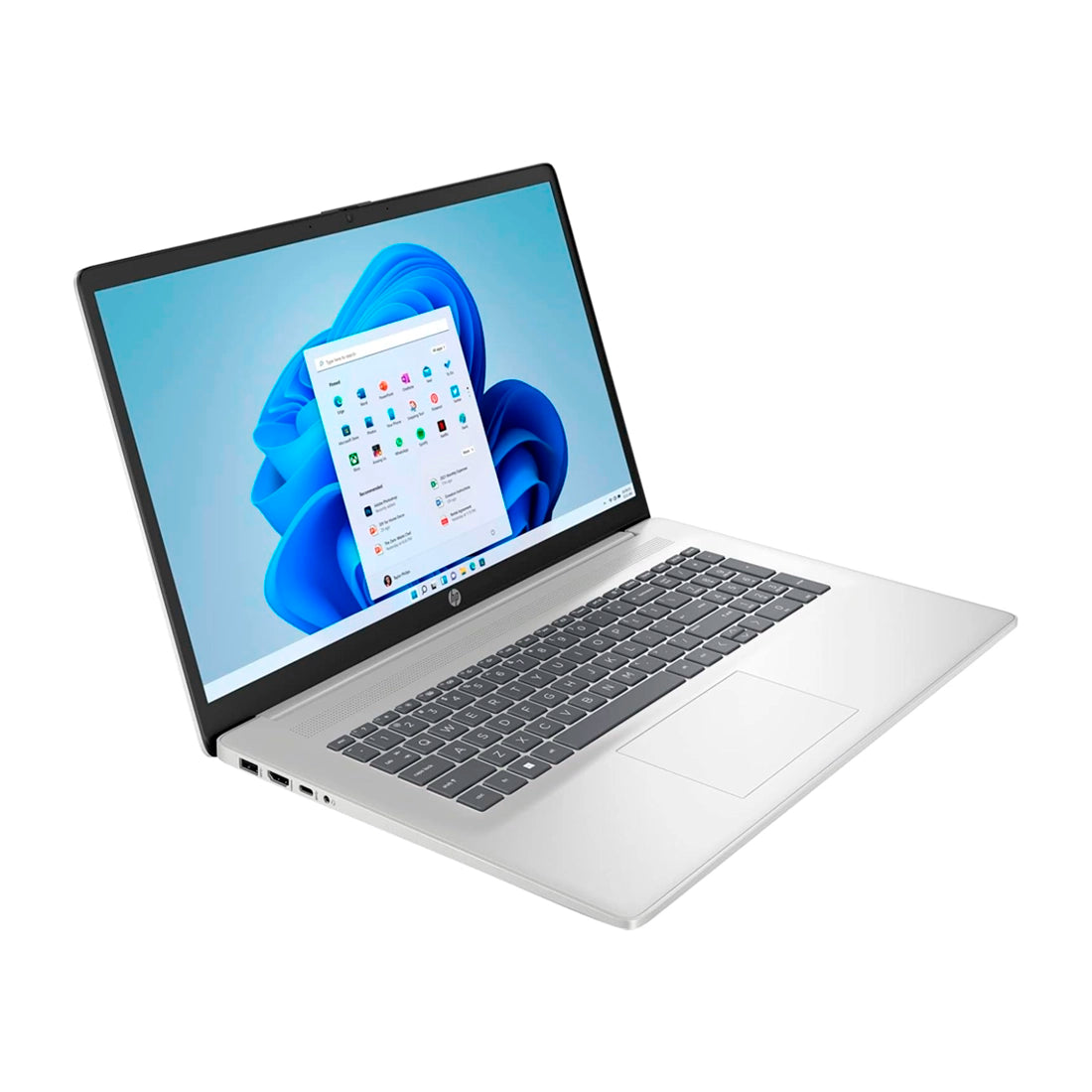 Laptop HP de 17.3 pulgadas color plata abierta mostrando gran pantalla y teclado completo con pad numérico - Laptop Express Caracas