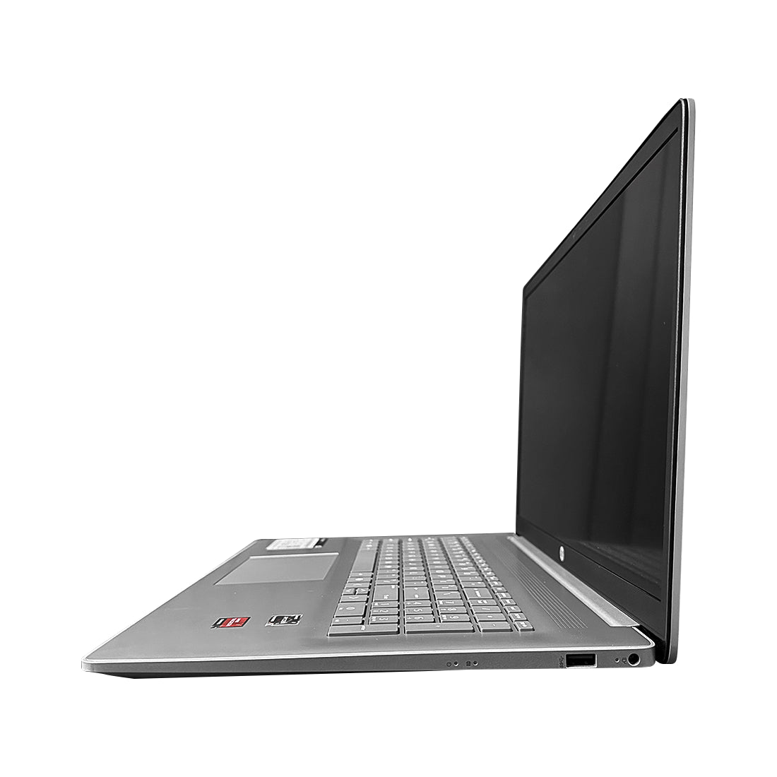 Laptop HP de 17.3 pulgadas color plata abierta mostrando gran pantalla y teclado completo con pad numérico - Laptop Express Caracas